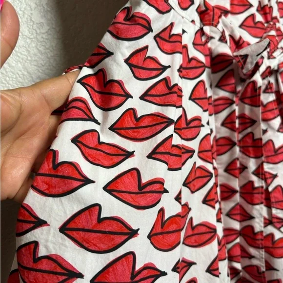 Anthropologie Red Smooch Dress. All Over Red Lip Design. Button Front. Pockets. - Picture 2 of 16